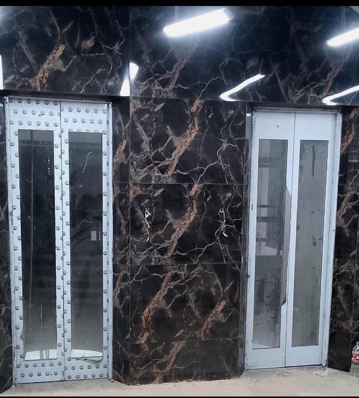 Glass elevator doors during lobby fit-out